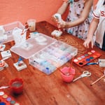 Creative children painting together at a table