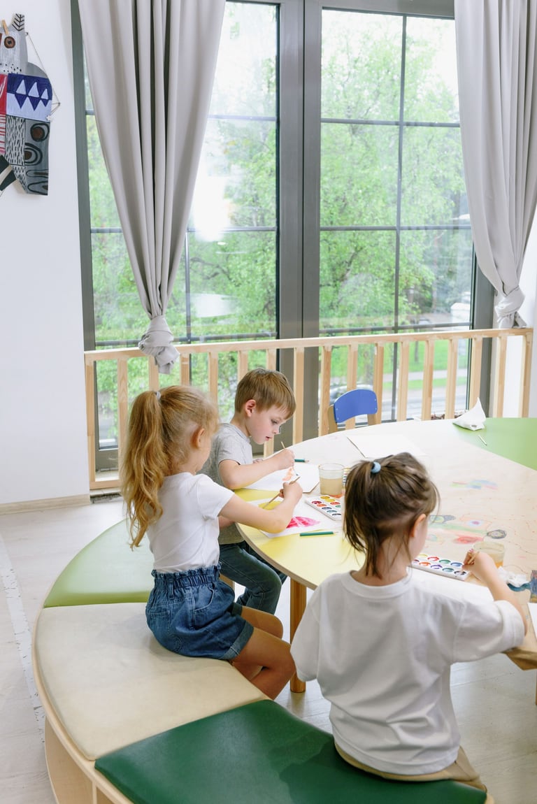 Children painting with watercolours